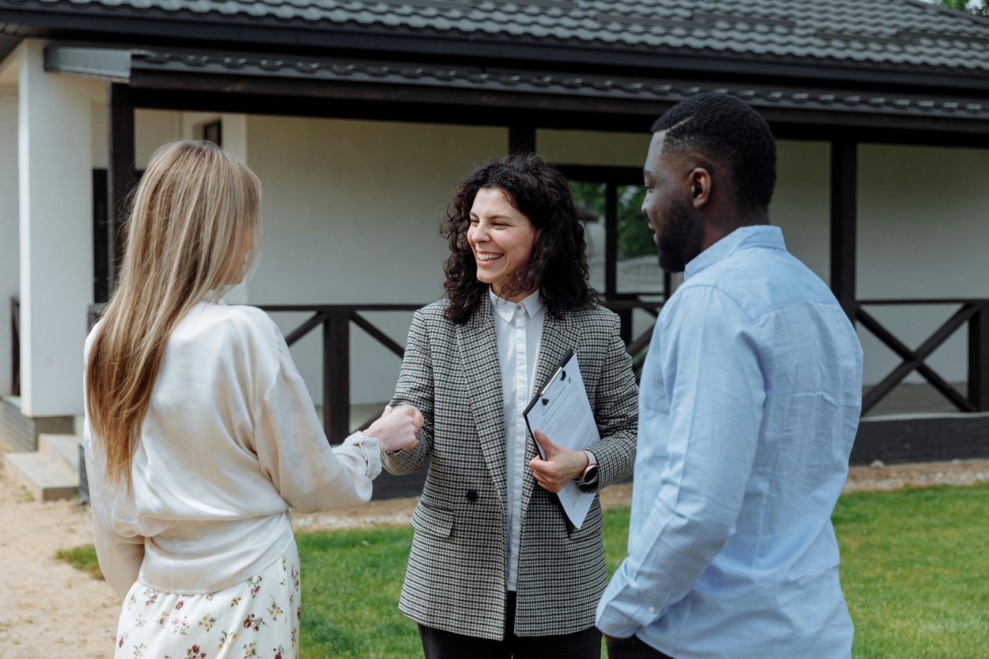 A real estate agent shaking hands
